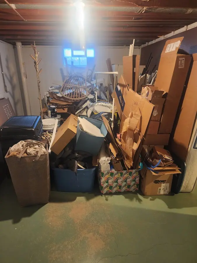 Roll-off dumpster container at job site for 2 Yard Dumpster Rental in North Madison